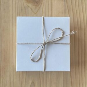 How to price a service: a plain white box tied with twine, ready to be offered