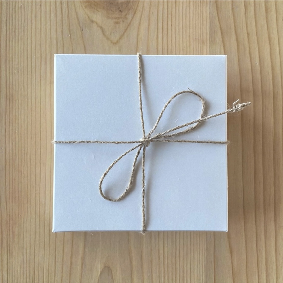 How to price a service: a plain white box tied with twine, ready to be offered