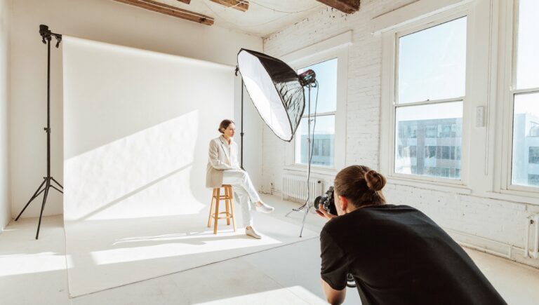 Media placement in the making: a founder photographed for a profile in a bright studio