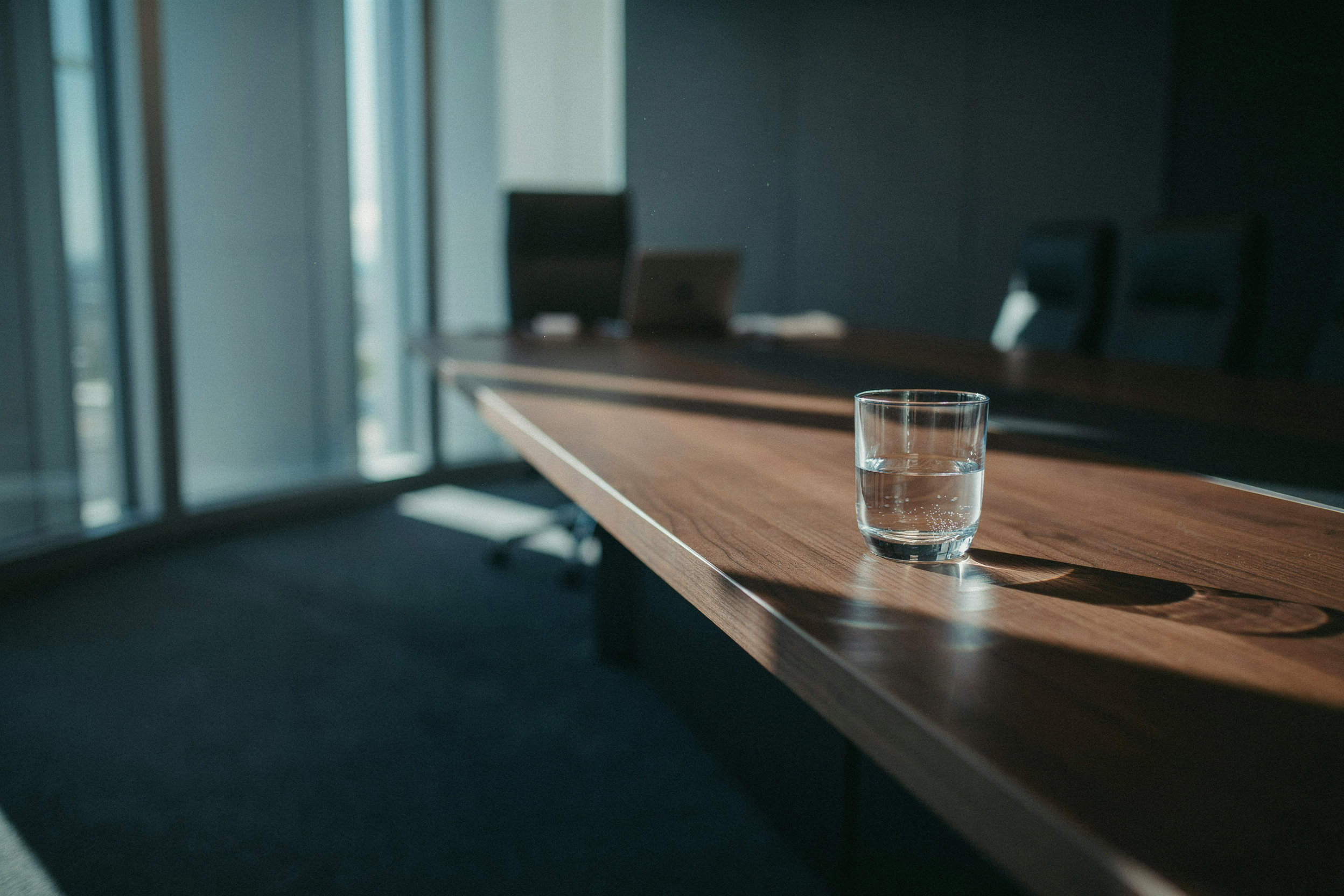 A glass of water on a boardroom table, the cheapest executive nutrition change available