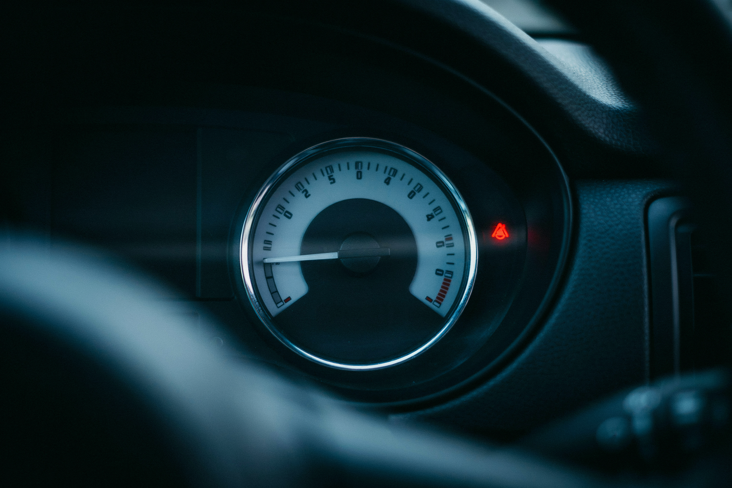 A fuel gauge near empty, showing that persistence in entrepreneurship is limited by runway