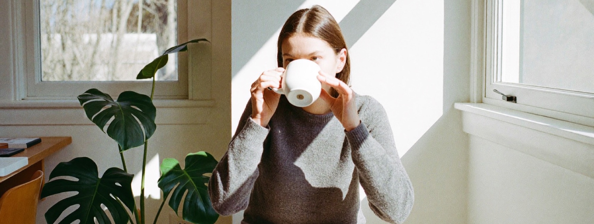 What a solo business actually earns: an owner taking stock with a morning tea at home