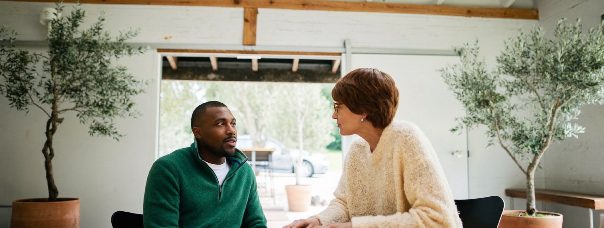 A landscape gardener listens as his bookkeeper explains what he has not been paying himself