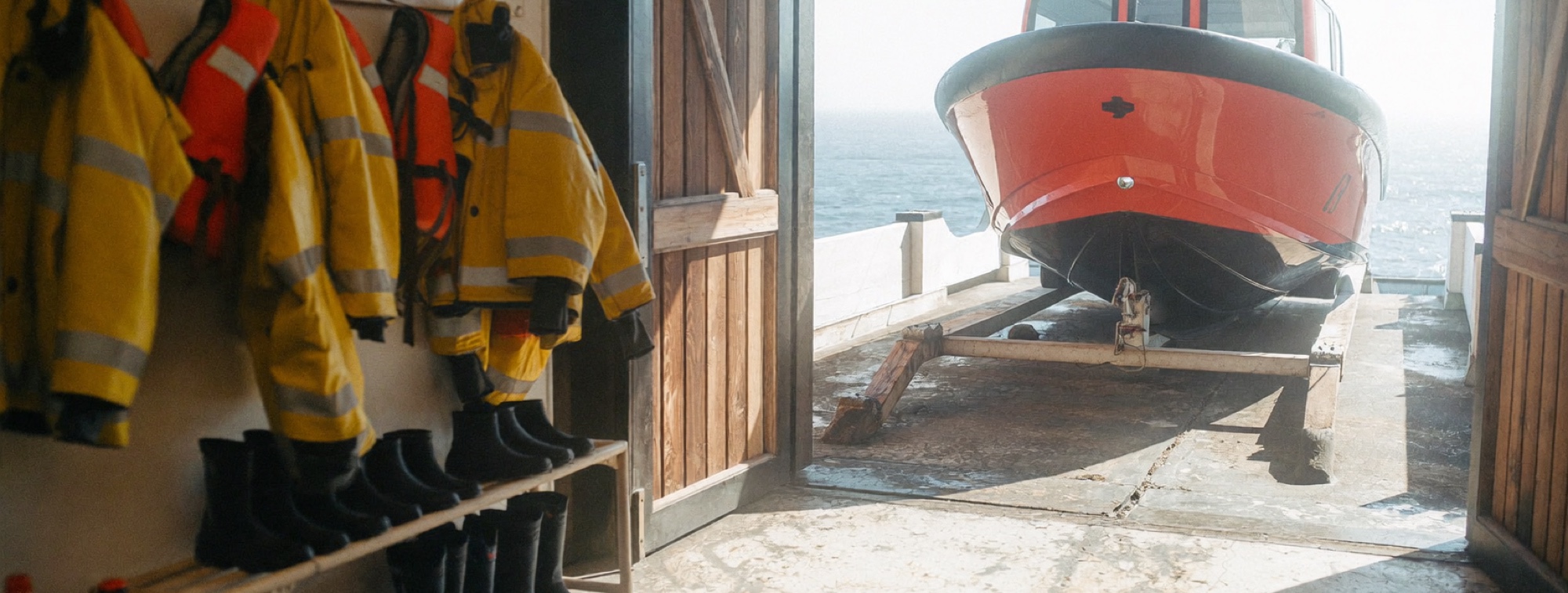 A lifeboat station ready to launch, where a slow decision costs more than a wrong one