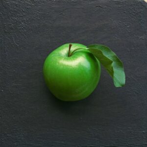 A green apple, the oldest symbol of paying for an education
