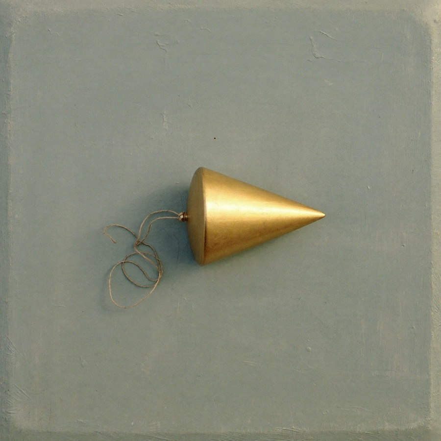 A brass plumb bob, one fixed reference to measure everything else against