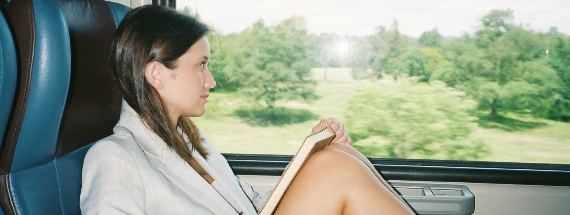 Writing a vision statement: a chief executive on a morning train with a closed notebook
