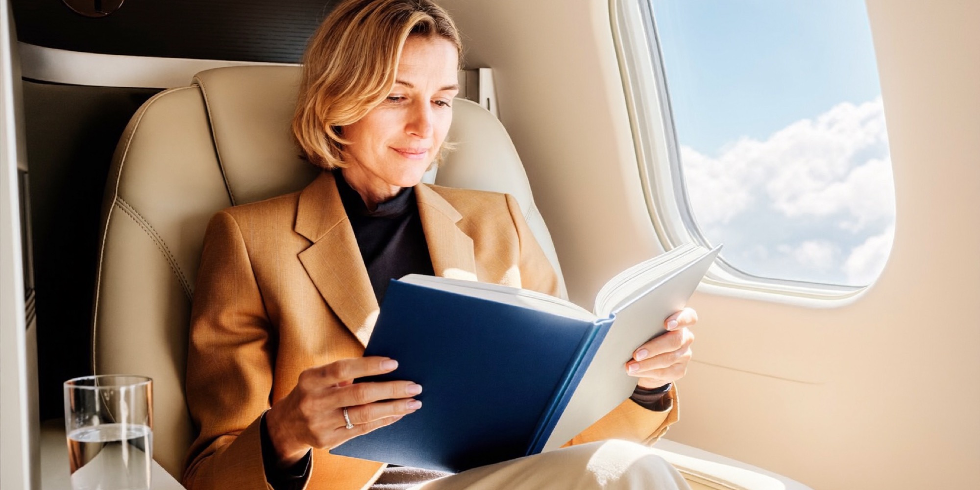 An executive reading on a flight