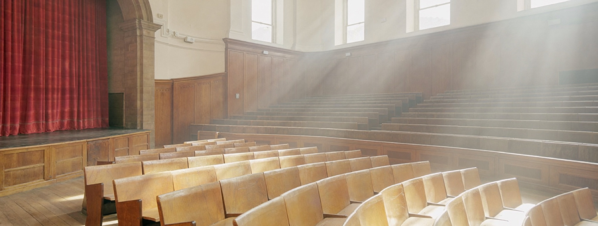 An empty lecture theatre, where most of us first learned to take notes badly