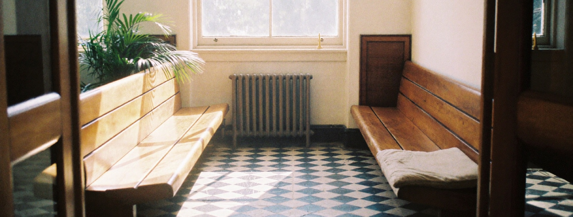 An empty station waiting room, the kind of spare minutes that add up to books