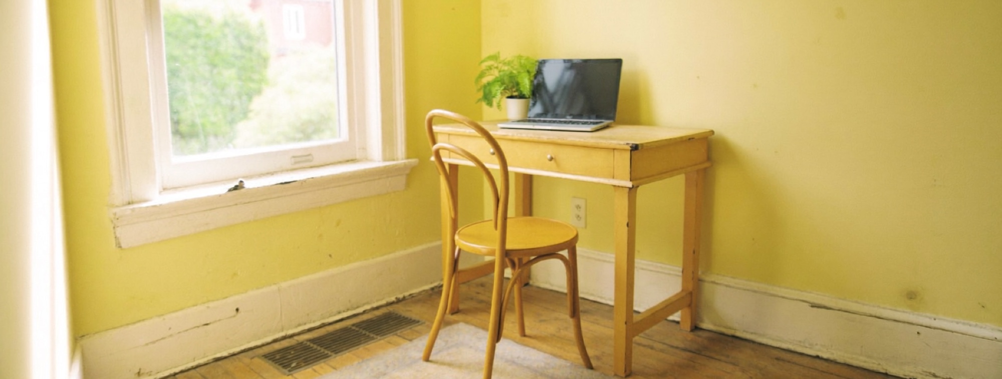 A quiet home desk where most of the day's emails and documents get written