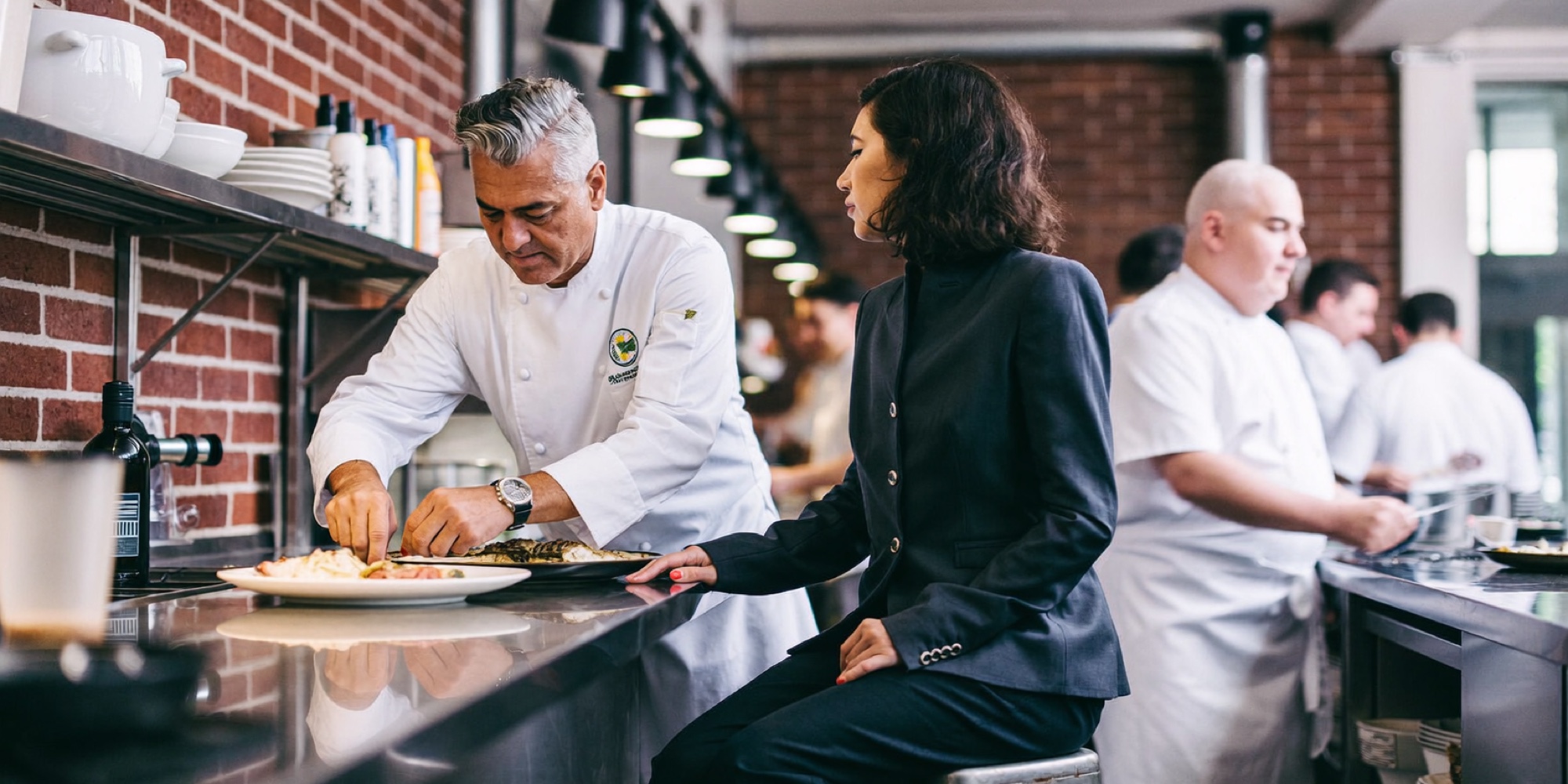 A prospective owner watching the kitchen she may buy during service, part of due diligence