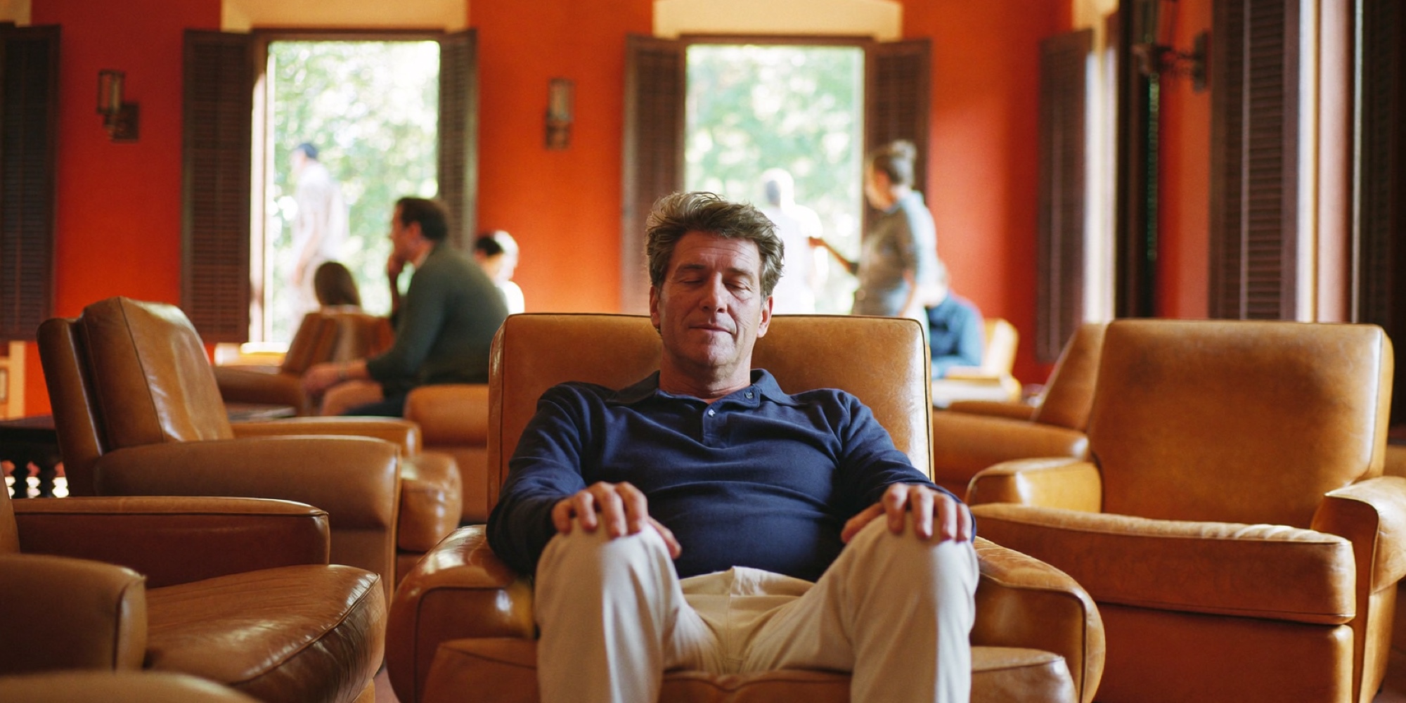 An executive taking a slow minute between meetings instead of another espresso