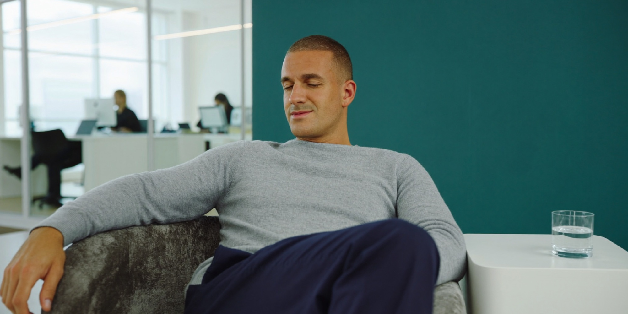 An executive taking a short rest in a company quiet room