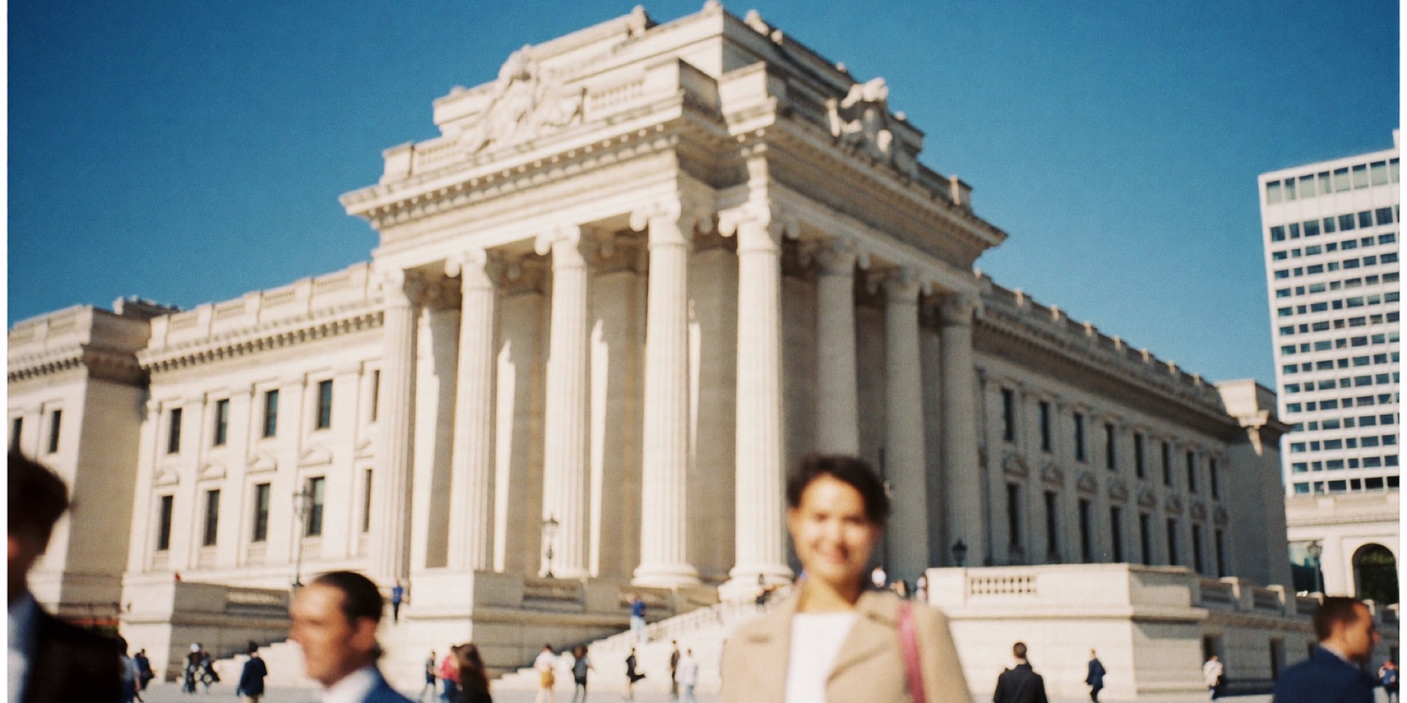 A financial district building, home of the funds that compete on fees