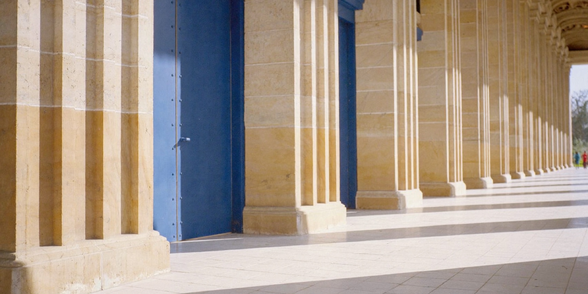 The colonnade of an old bank, where money is kept for the long term