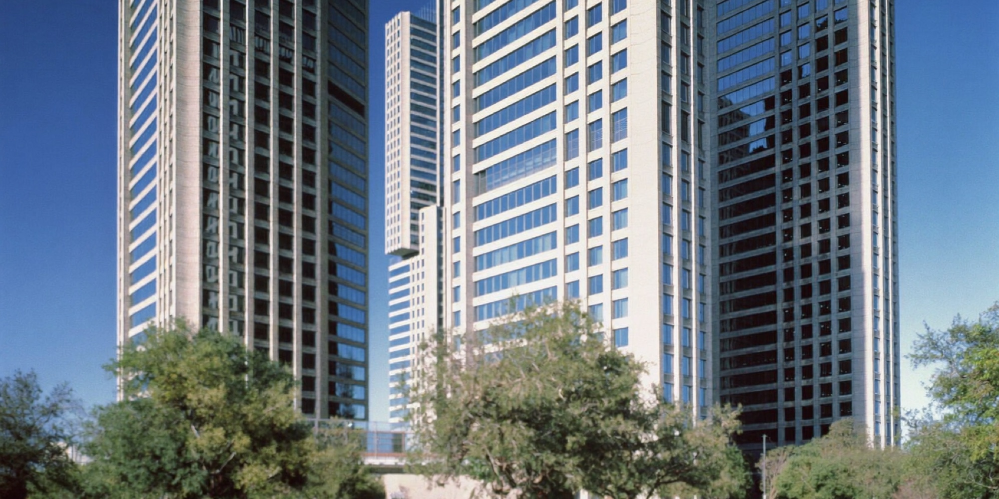 Four office towers, a shape familiar to anyone who has hired one of the Big Four