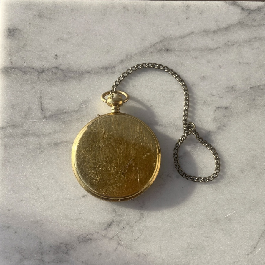 A closed brass pocket watch, the hours a consulting rate has to pay for