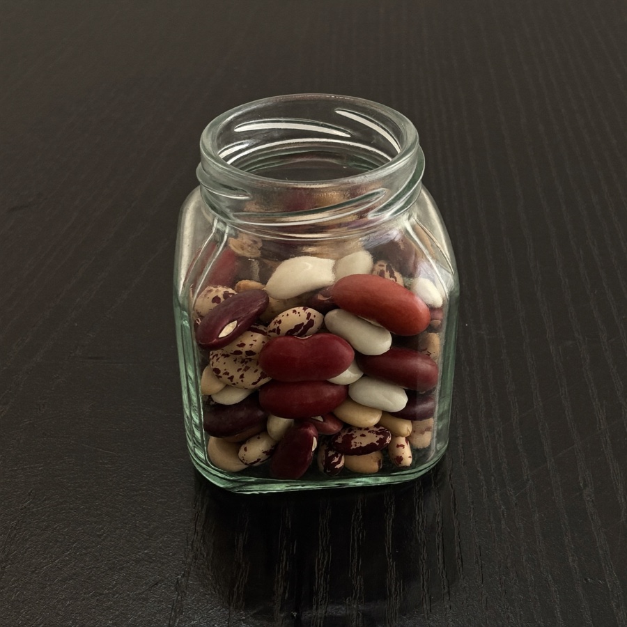 A jar of mixed beans, the spread an index fund buys