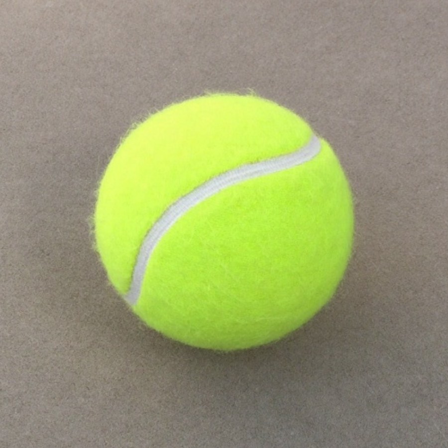 A yellow tennis ball, for the evenings a balanced career gives back