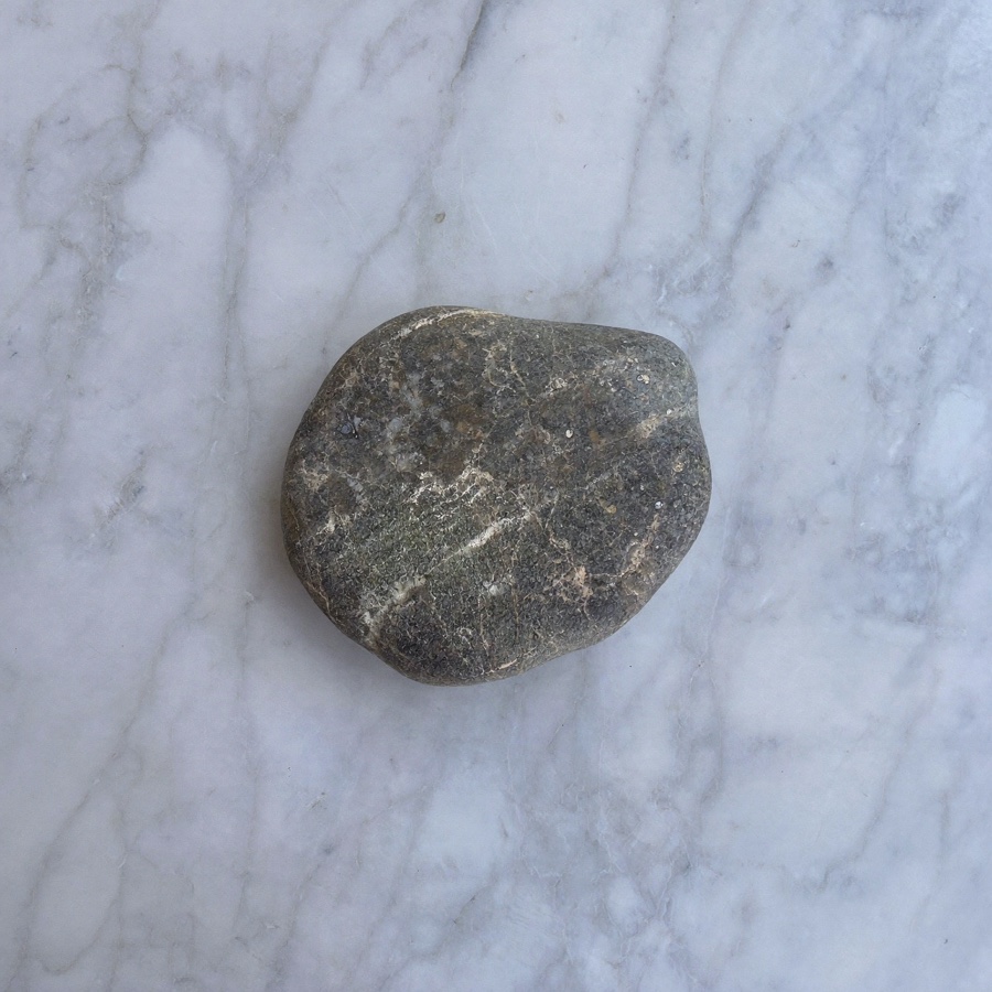 A single smooth stone, a symbol of one thing at a time