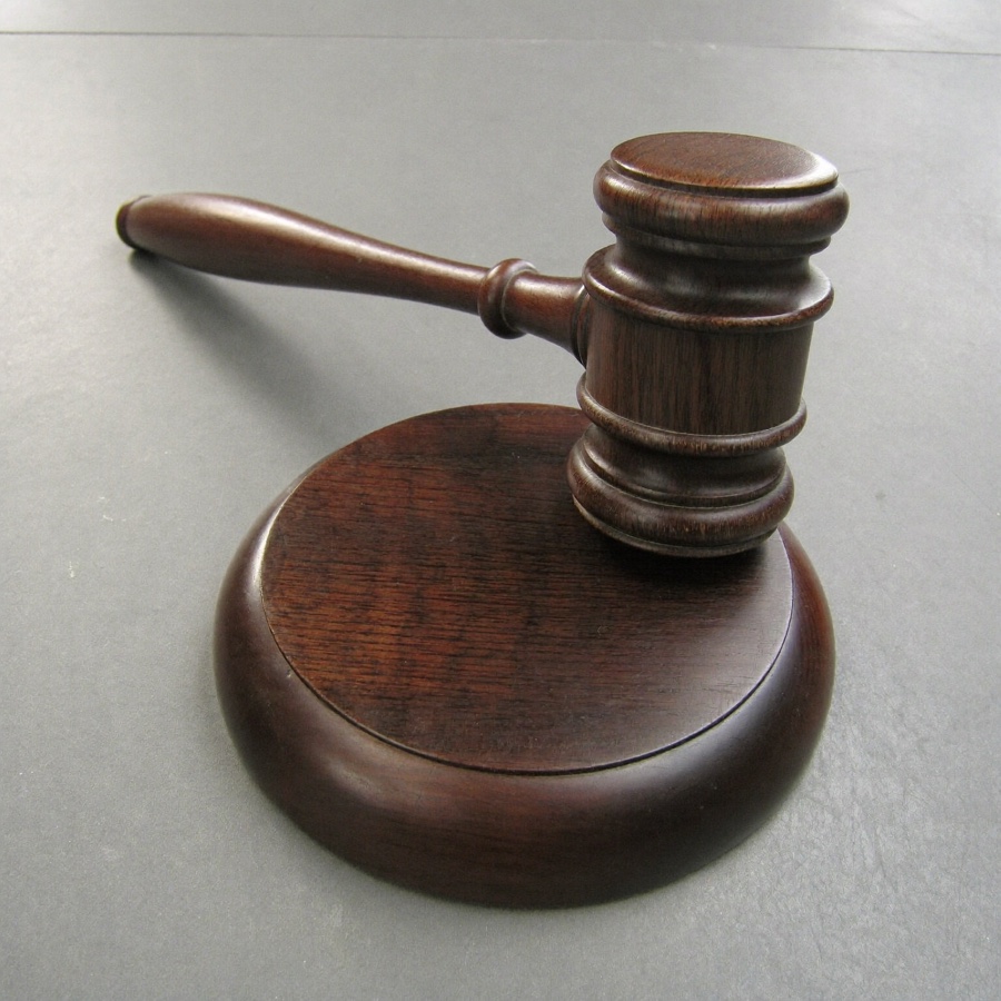 An auctioneer's gavel on its sound block, for an article on how to sell a small business