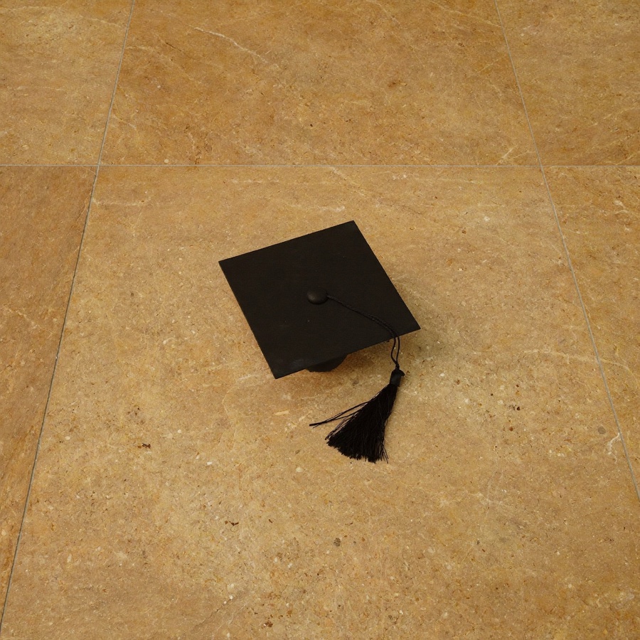A black graduation mortarboard, the credential an online MBA buys