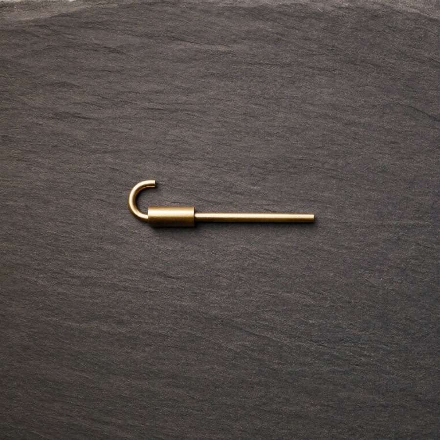A brass spanner on slate, for an article on what is upskilling