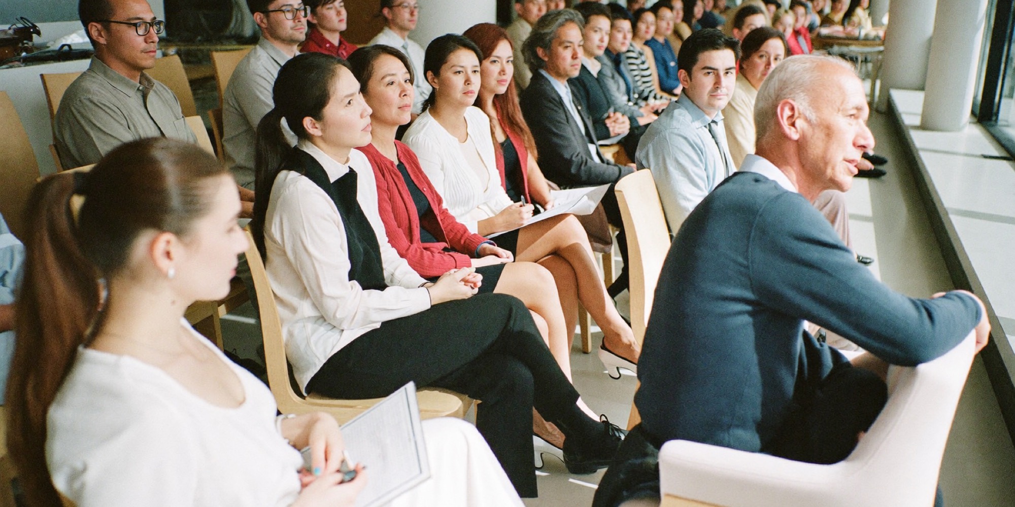 A chief executive taking questions from staff at an all-hands meeting, showing which one a team is missing