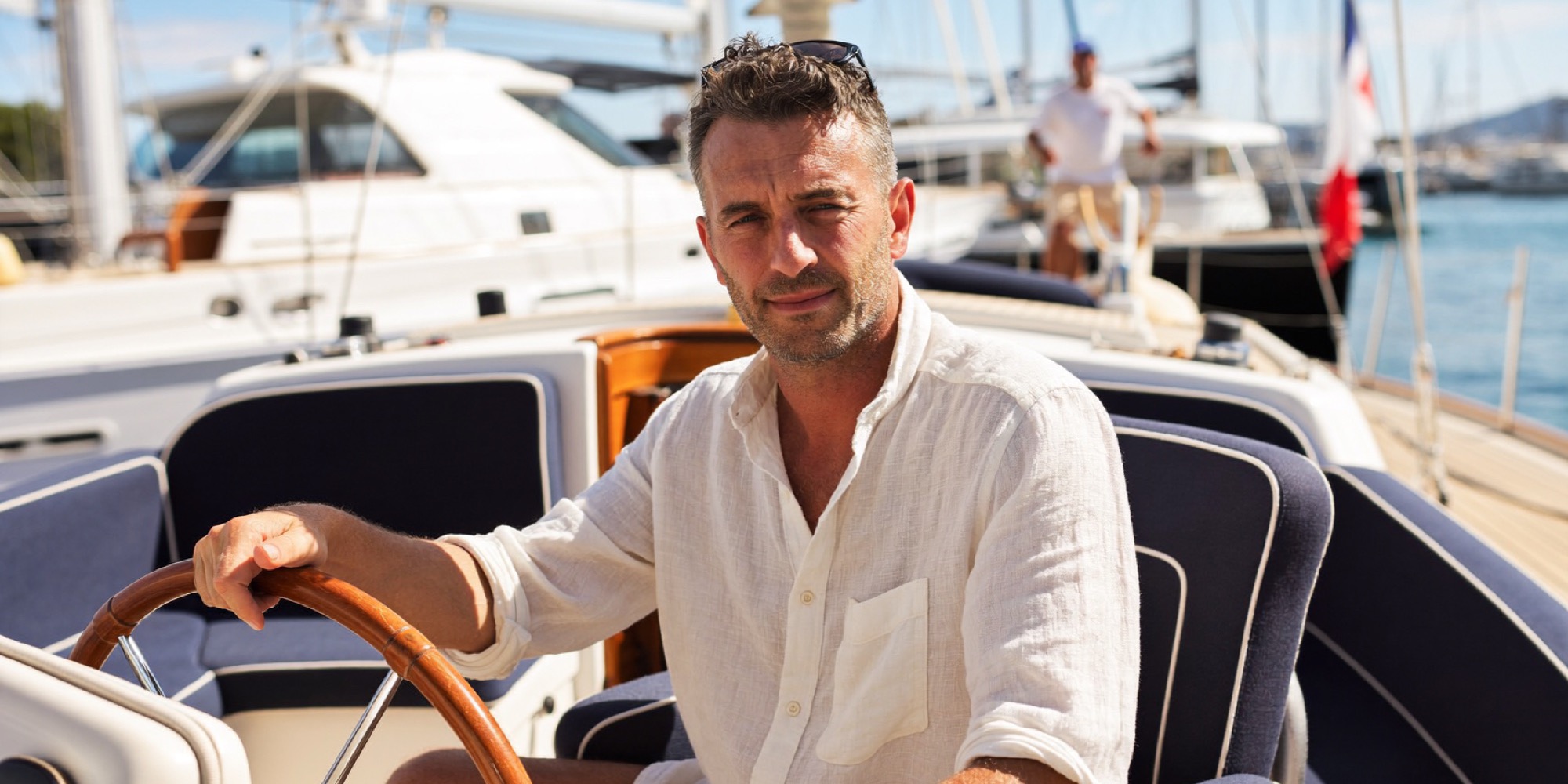 A founder at the helm of his yacht on a weekday morning, time bought by equity