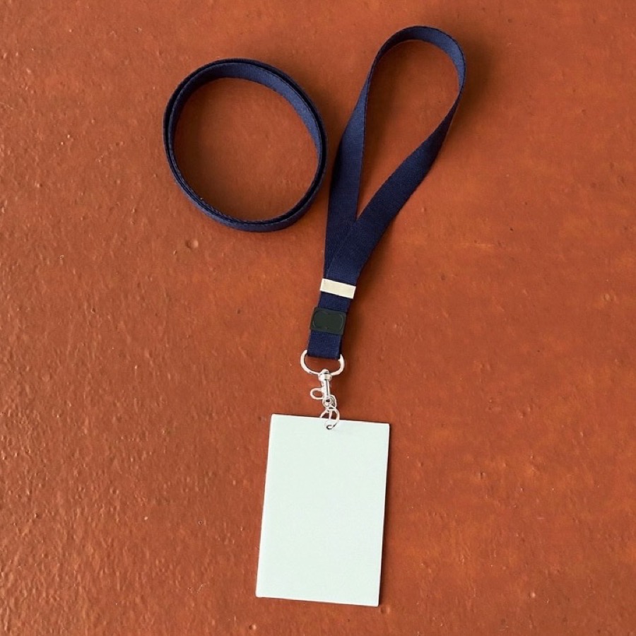 A visitor lanyard, the badge an augmented team member wears on day one